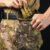 Operator using a multicam wholesale tactical dump pouch attached to duty belt - PANOAR