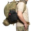 Operator wearing a black tactical trauma kit bag attached to backpack - PANOAR