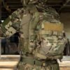 ide view of a molle tactical backpack attachment mounted on a vest