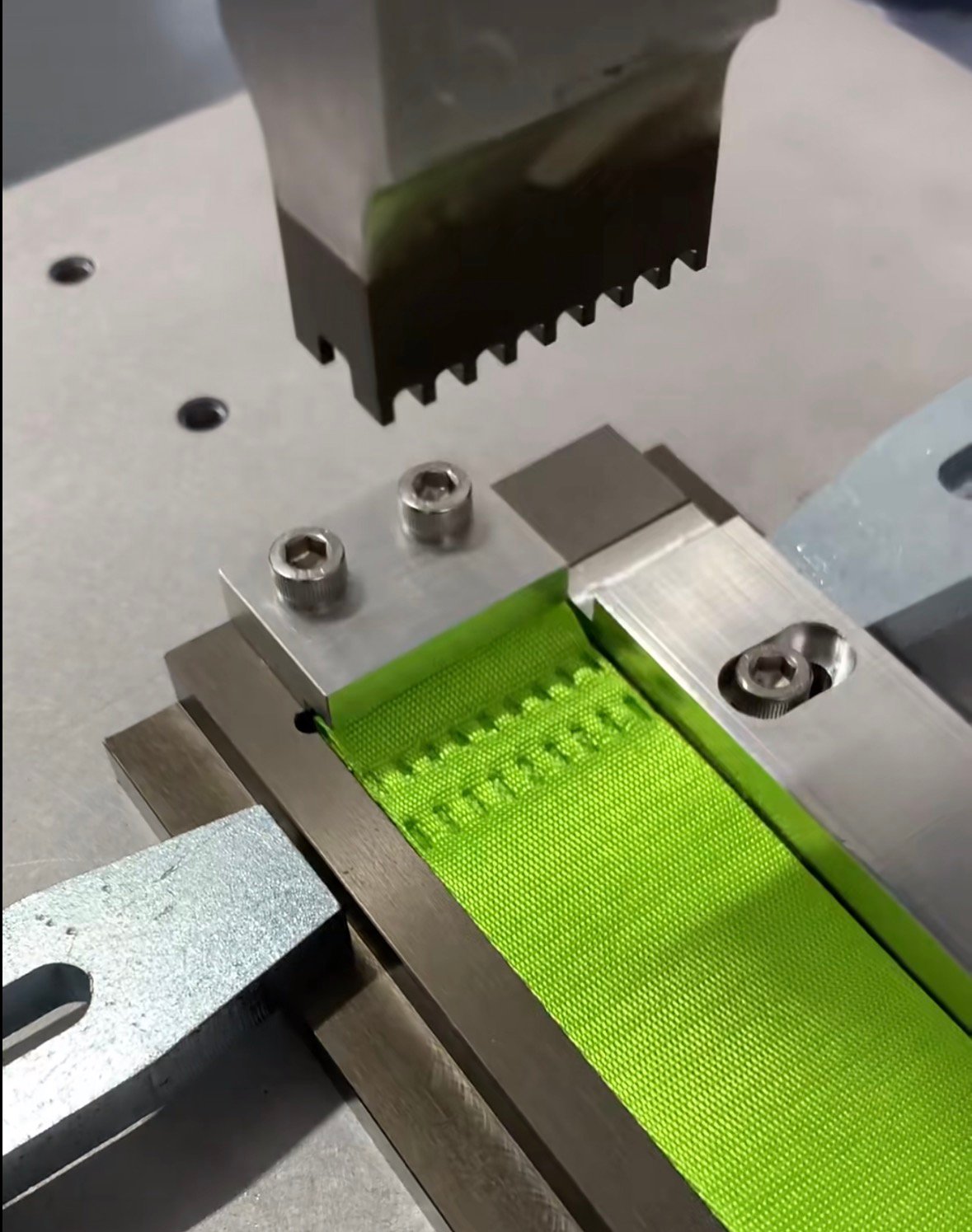Heat pressing and bonding process on tactical gear components