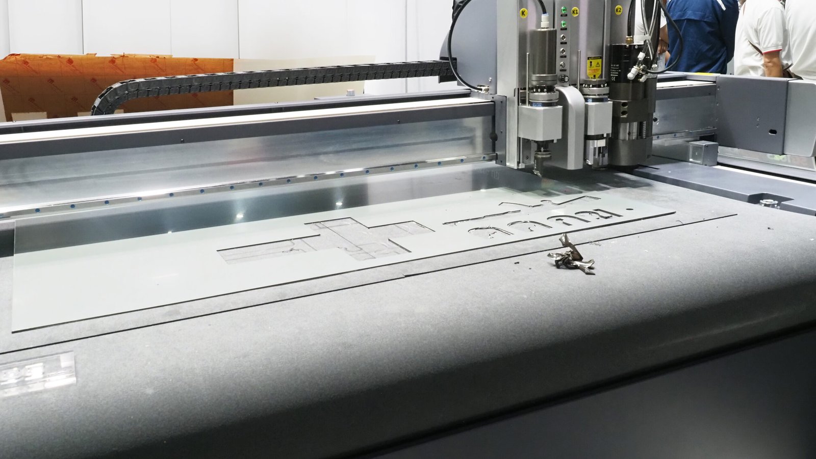 CNC die-cutting press for high-volume tactical gear panel cutting