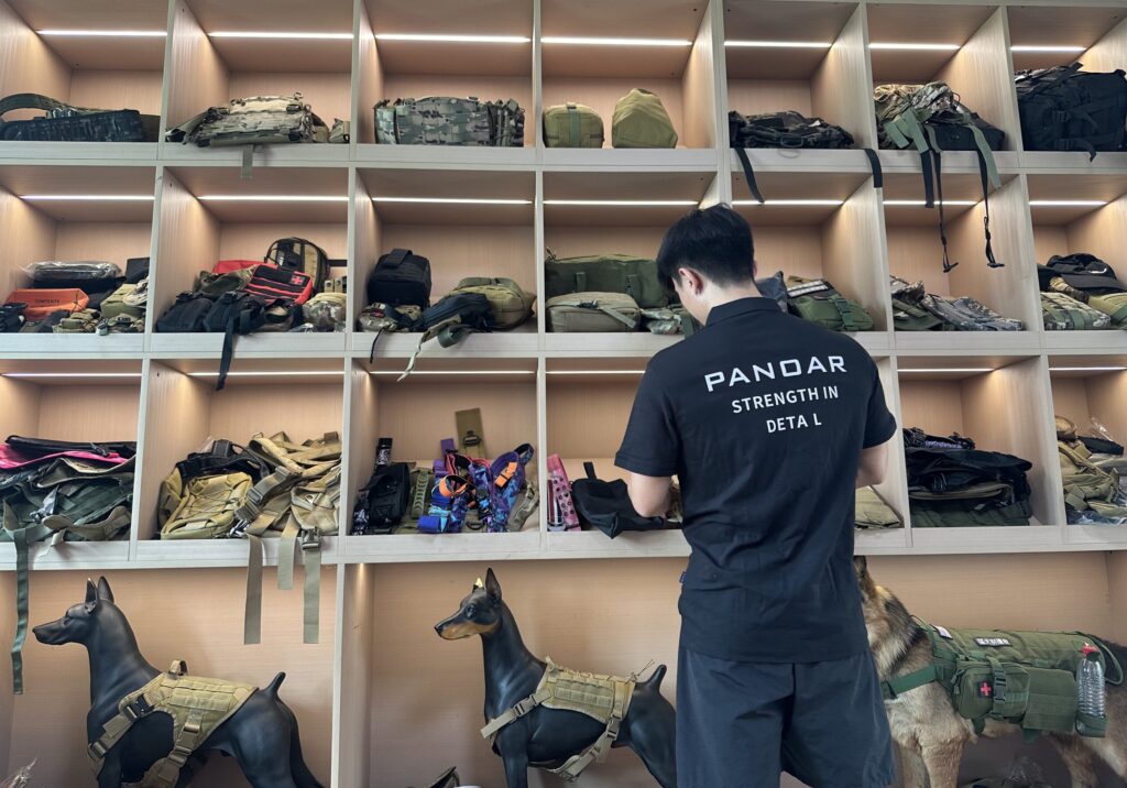PANOAR tactical gear showroom displaying custom tactical backpacks, MOLLE equipment, pouches and professional gear for OEM manufacturing