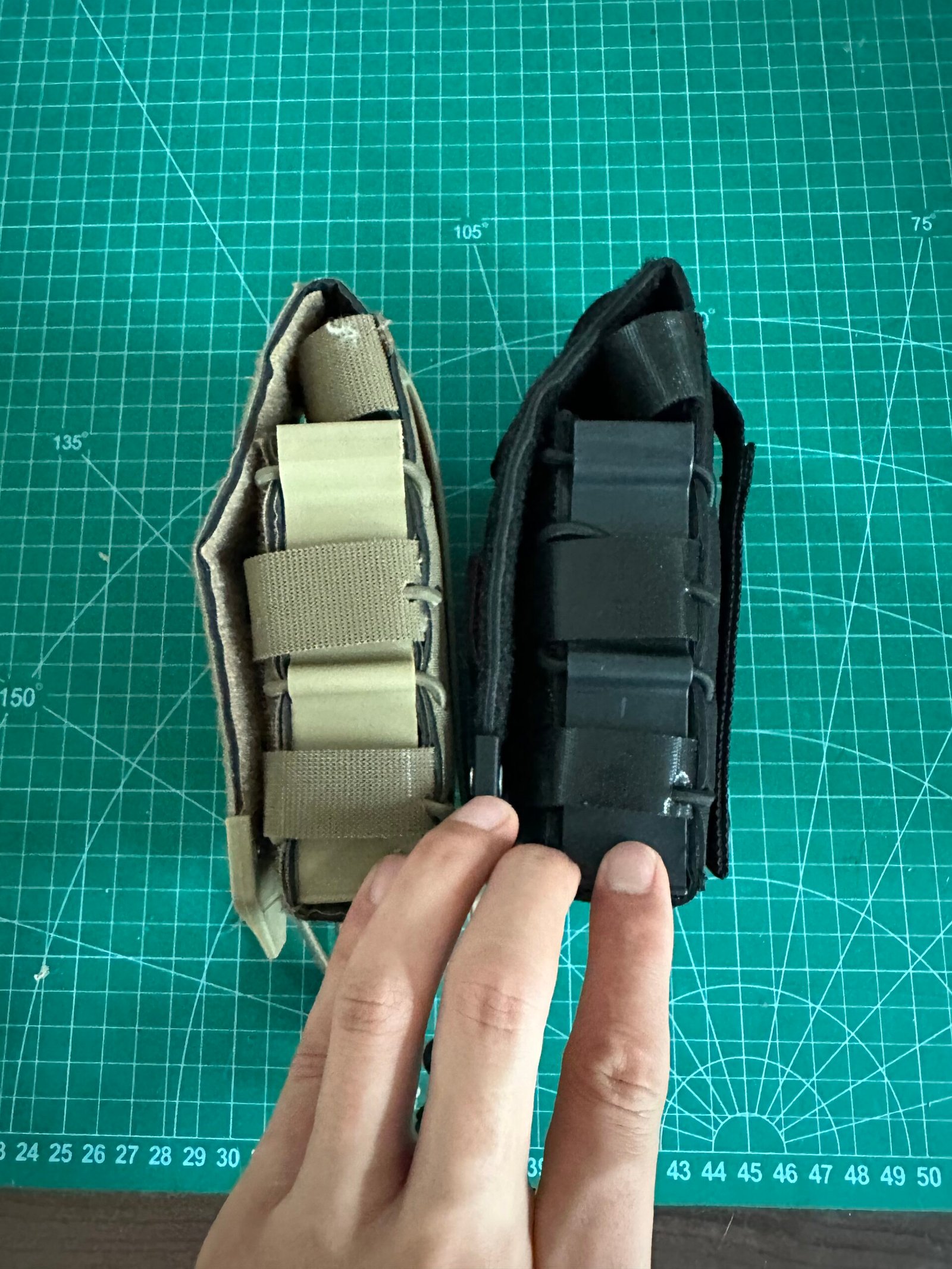 Custom MOLLE pouch sample comparison during OEM development