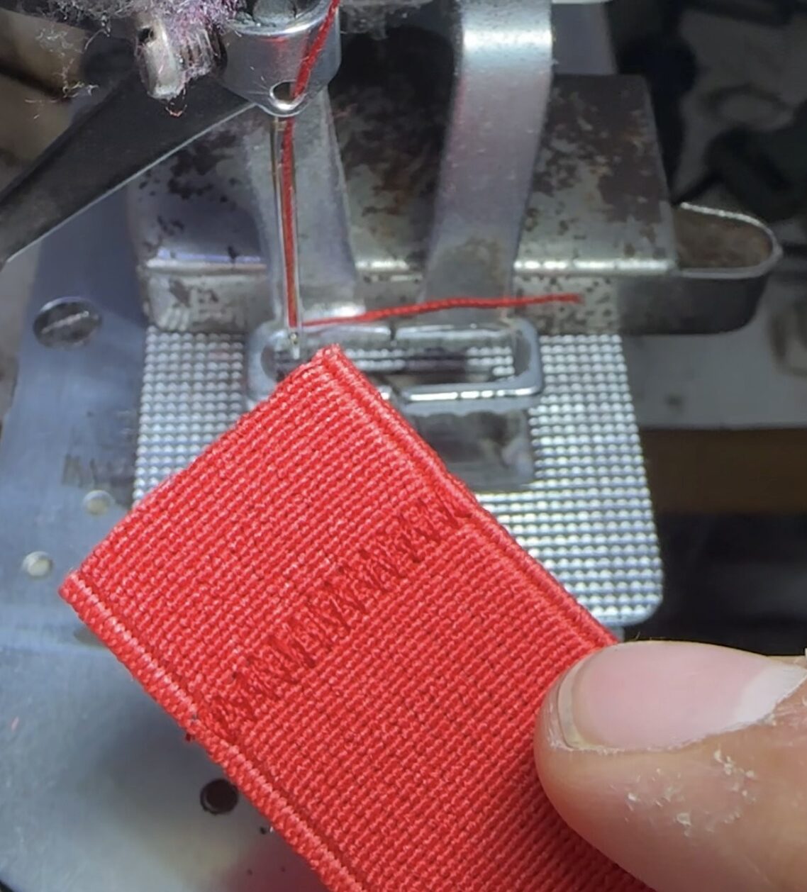 Private label logo sewing process for custom tactical gear manufacturing