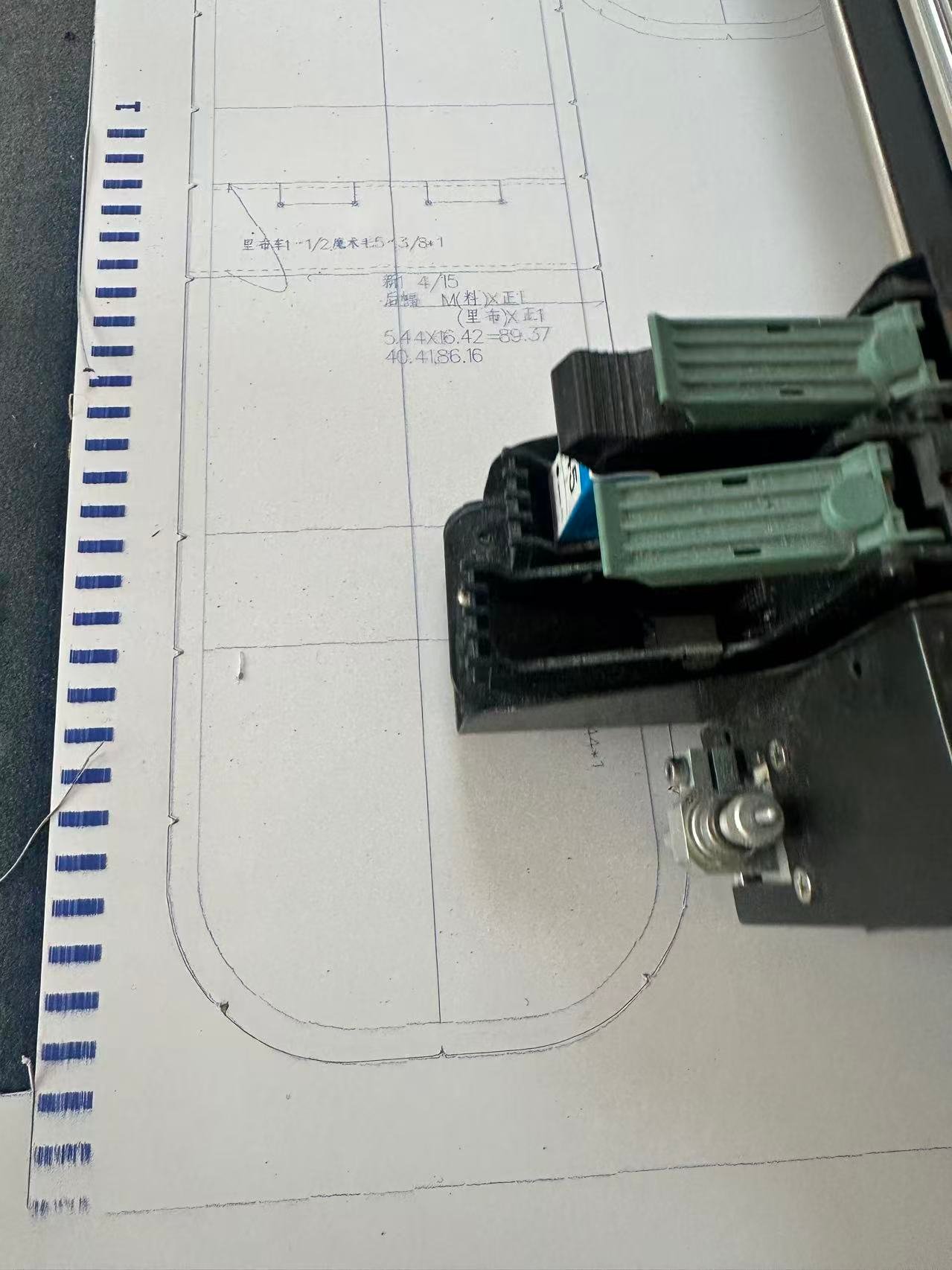 Paper pattern with marked outlines and hardware components