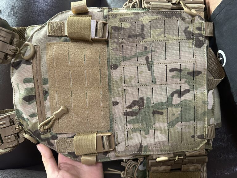 Plate carrier back panel with a zipper pocket, hook-and-loop admin patch and MOLLE webbing rows
