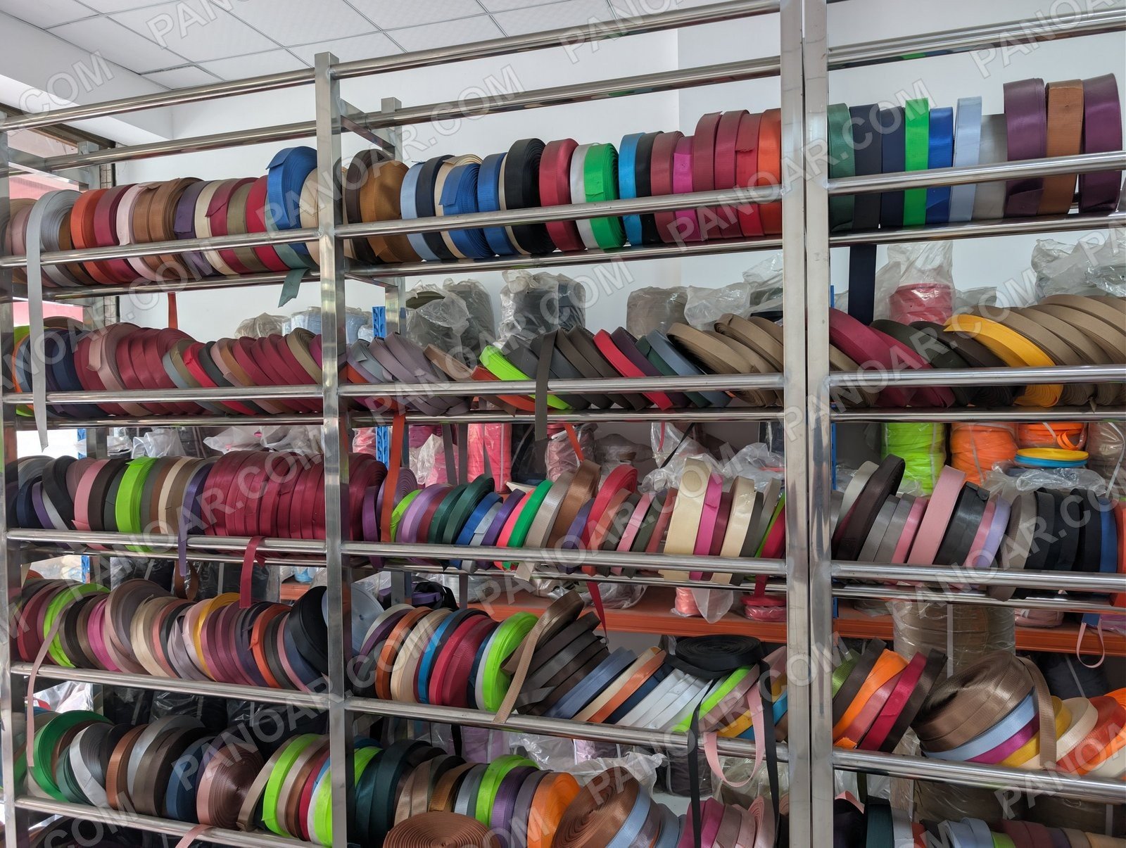 Colored narrow tapes on open shelves