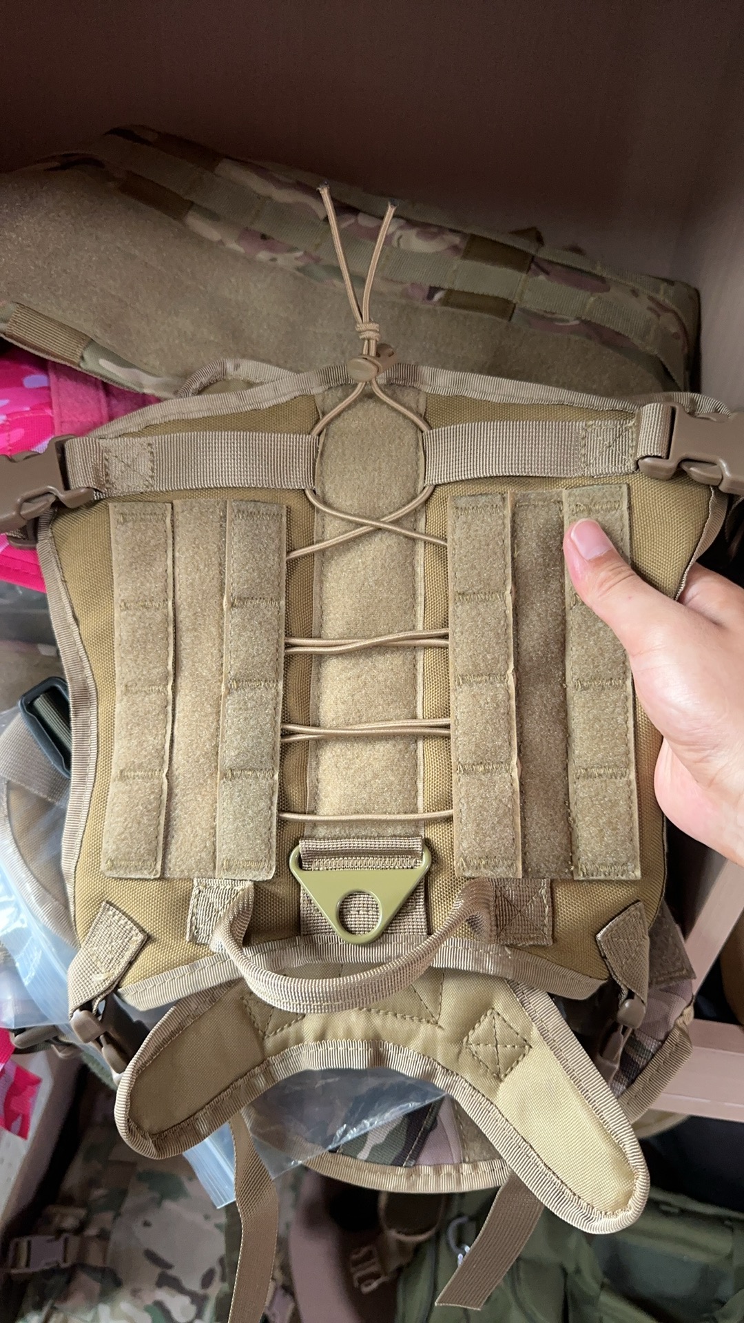 Webbing attachment stitching and Box-X patterns on a dog vest