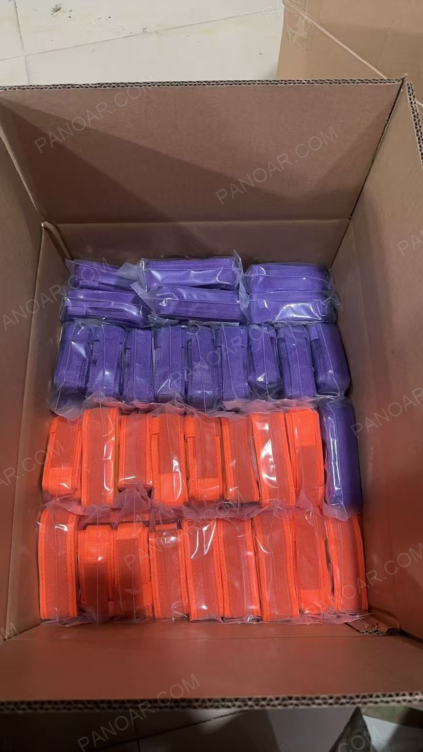 Purple and orange dog collars individually bagged in a carton